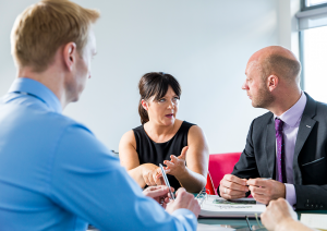 up close of tender team members having a discussion