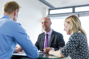 tender team members having a meeting